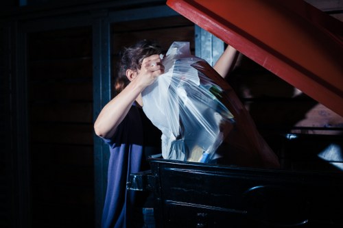 Professional waste clearance team managing construction debris